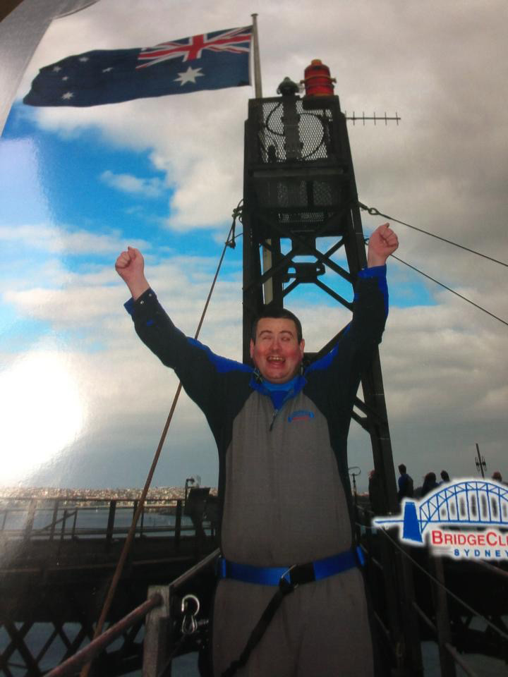 Photo of Martin Rigby on top of Sydney Harbour Bridge.