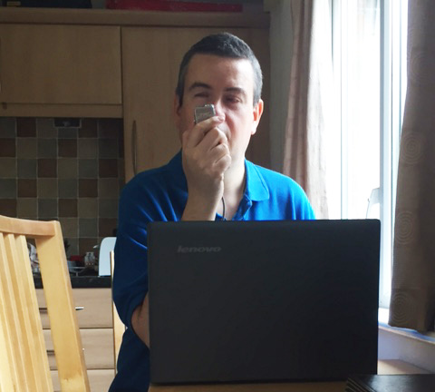 Photo of Martin Rigby recording newsletter