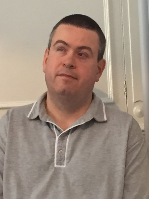 Photo of Martin Rigby sitting in his counselling room