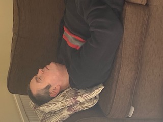 Photo of Martin meditating lying down